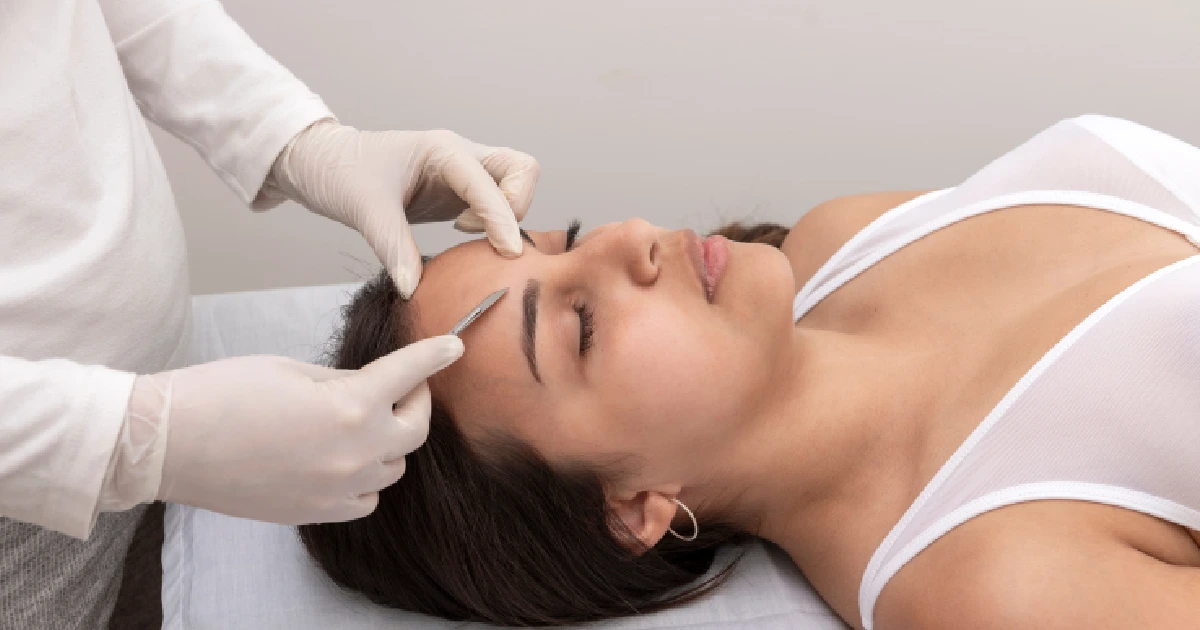 Woman receiving dermaplaning treatment in Waycross, GA